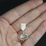 White Moonstone and Sapphire Dart Pendant