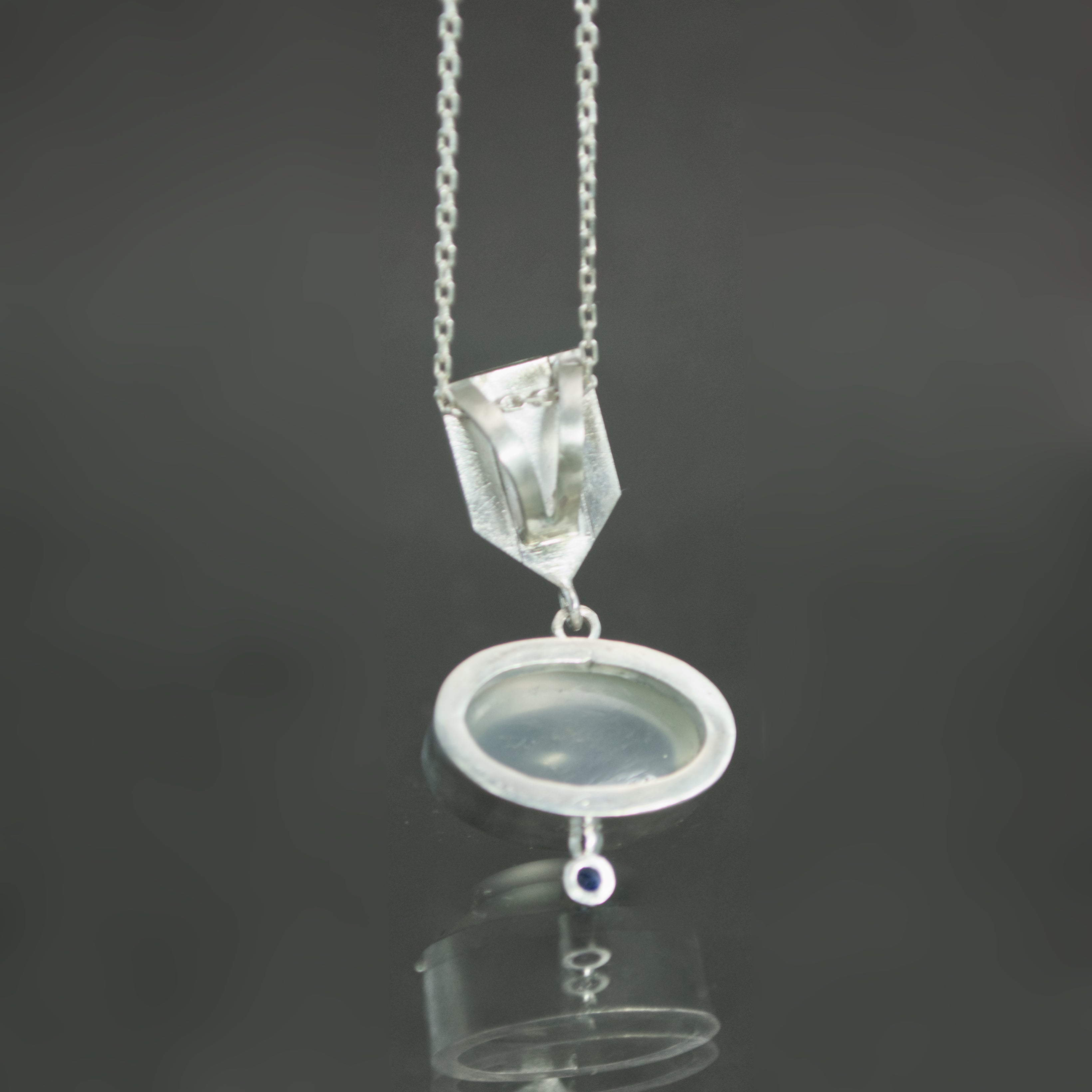 White Moonstone and Sapphire Dart Pendant