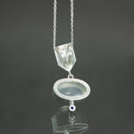 White Moonstone and Sapphire Dart Pendant