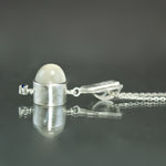 White Moonstone and Sapphire Dart Pendant