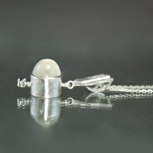 White Moonstone and Sapphire Dart Pendant