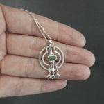 Tsavorite Garnet and Sapphire Deco Circle Pendant in Sterling Silver