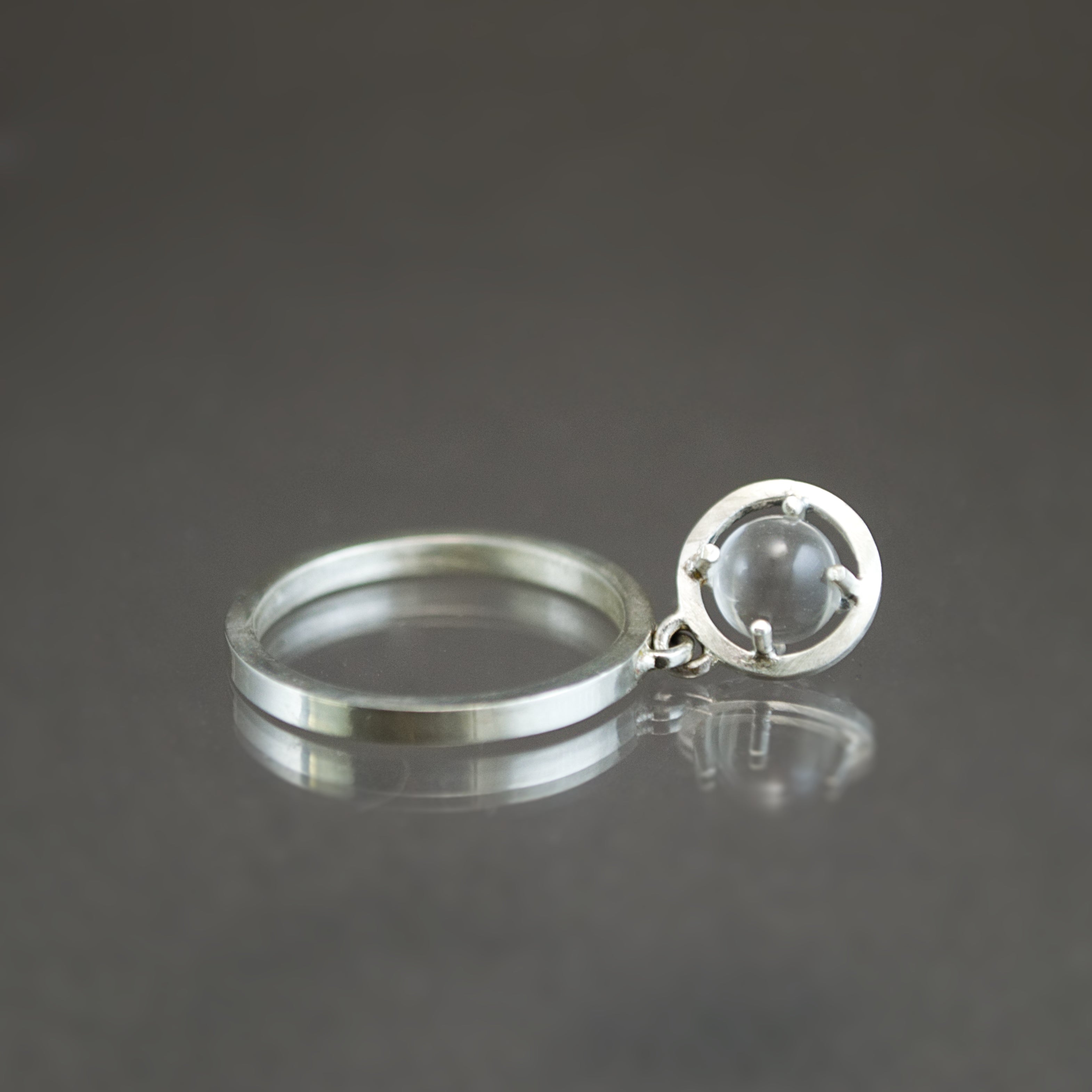 Caged Sphere Kinetic Ring