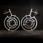 Kinetic planetary hoop earrings