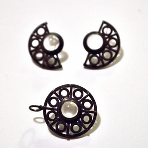 geometric ironwork pendant and earrings